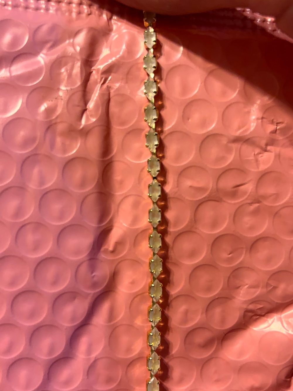 Gold Tennis Bracelet with Pear-Shaped light pink Stones